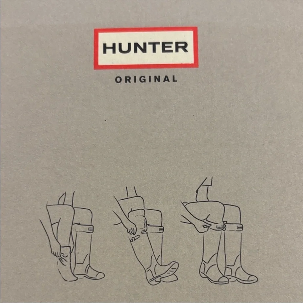 Hunter brand boot socks inserts.  Cream color with logo on front.